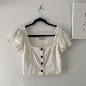 Y2K inspired white short sleeve crop top with square neckline and front buttons